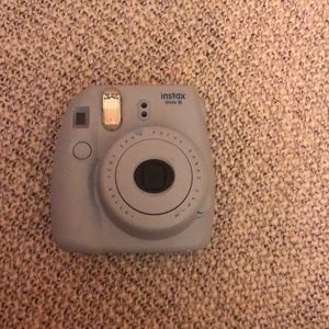 Blue polaroid camera